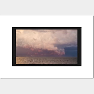 Colorful stormy sky over the ocean Posters and Art